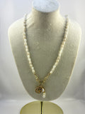 Handcrafted Mother of Pearl Rice Bead Necklace with Gold Sand Dollar Pendant