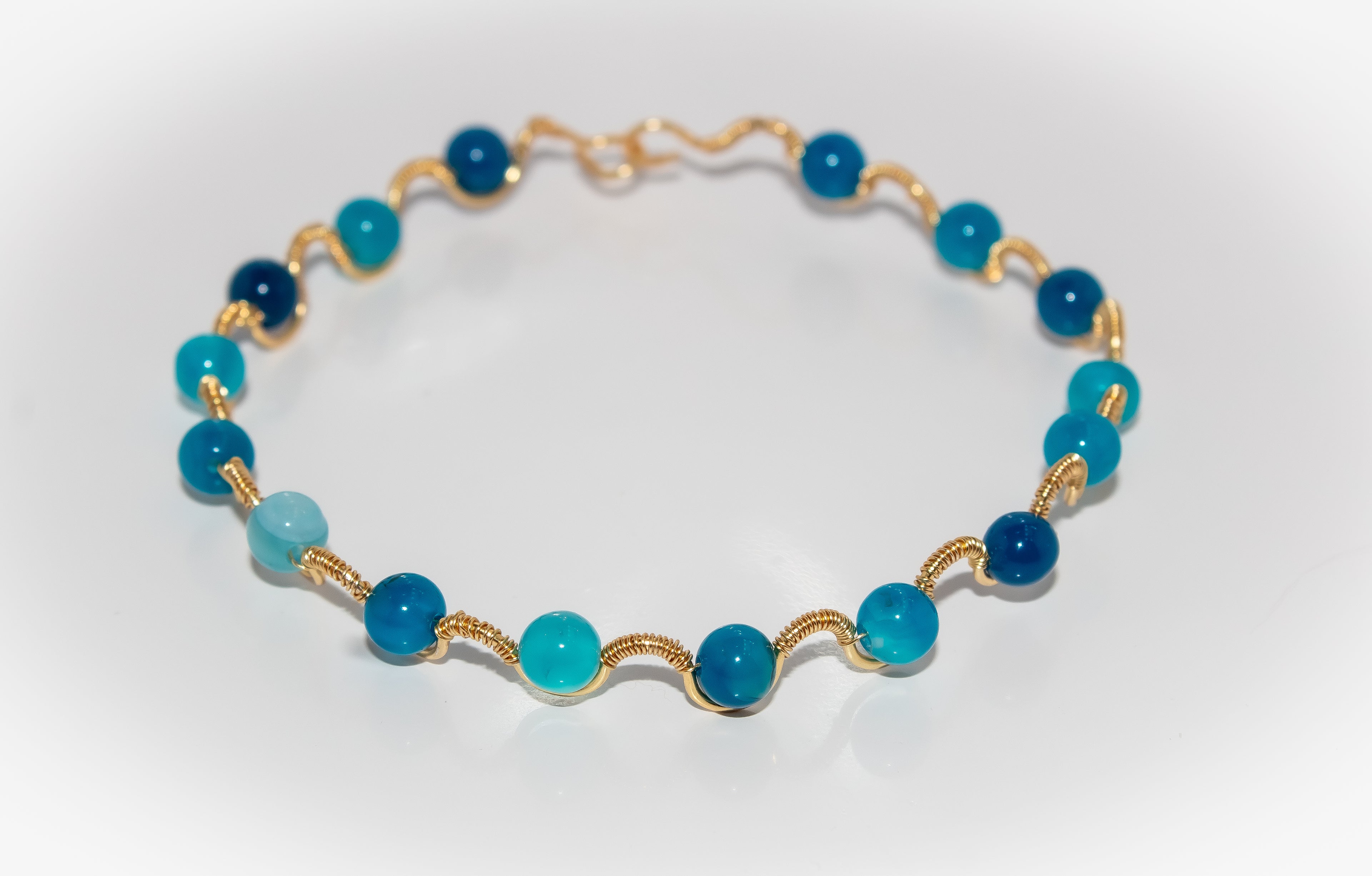 Handcrafted Gold Wire-Wrapped Ocean Blue Gemstone Bracelet