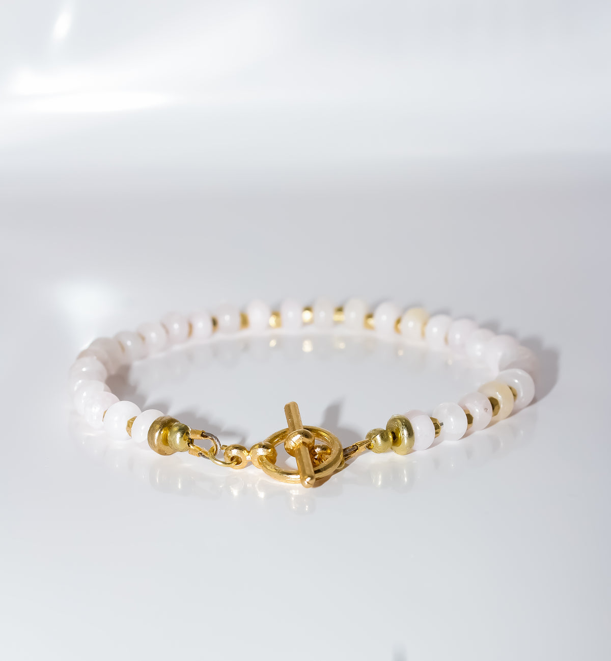 Pink Quartz Beaded Bracelet with Gold Spacers