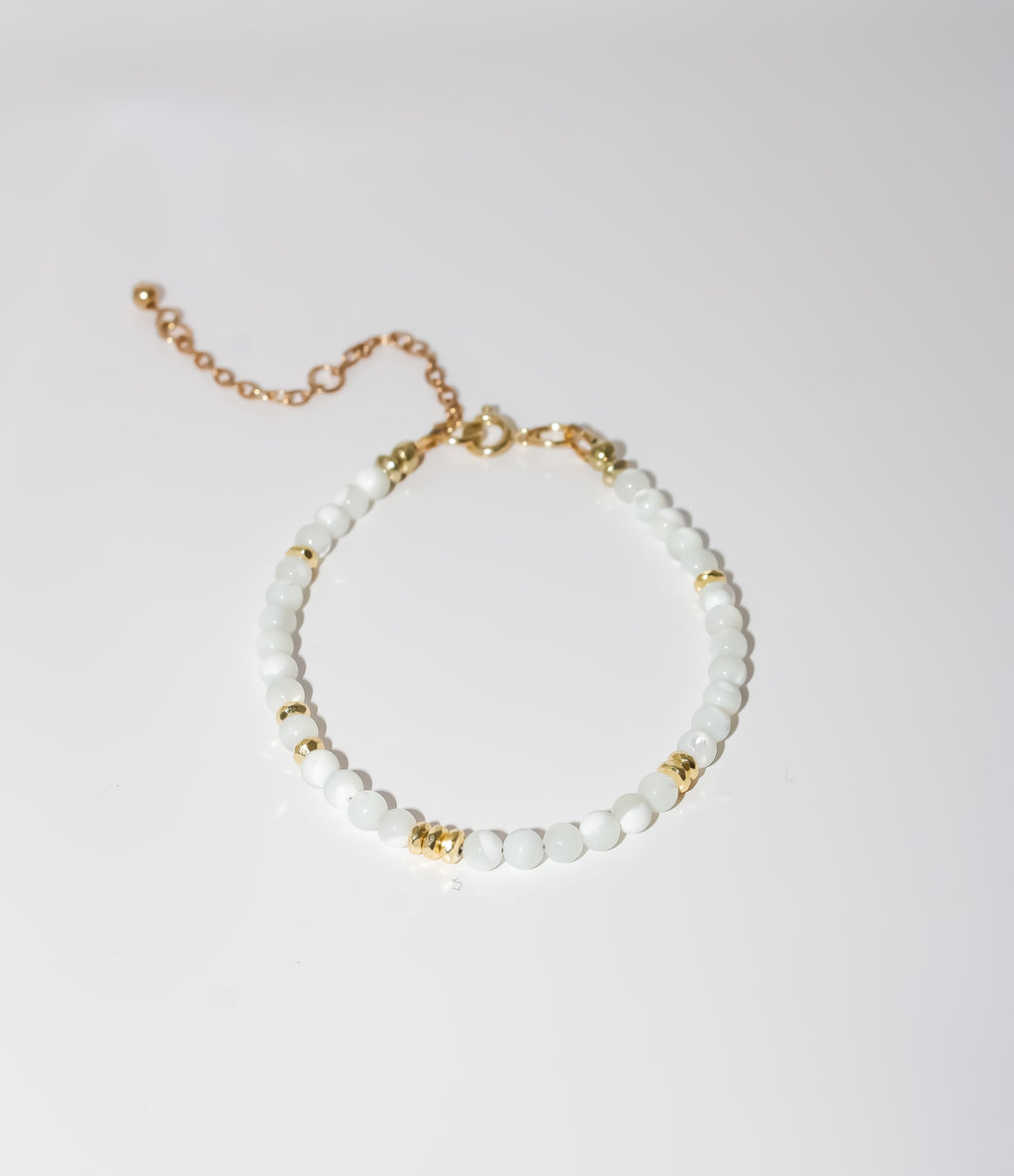 White Beaded Bracelet with Gold Accents