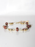 Gold-Rimmed Glass Bead Station Bracelet