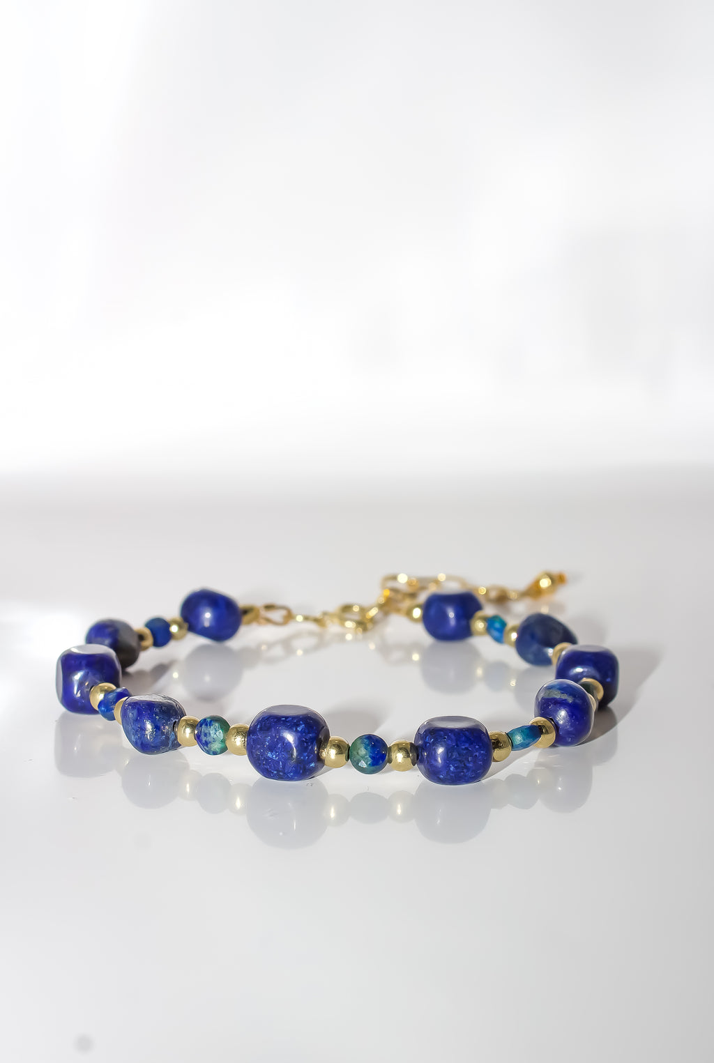 Lapis Lazuli Beaded Bracelet with Emerald Accents and Gold Spacers
