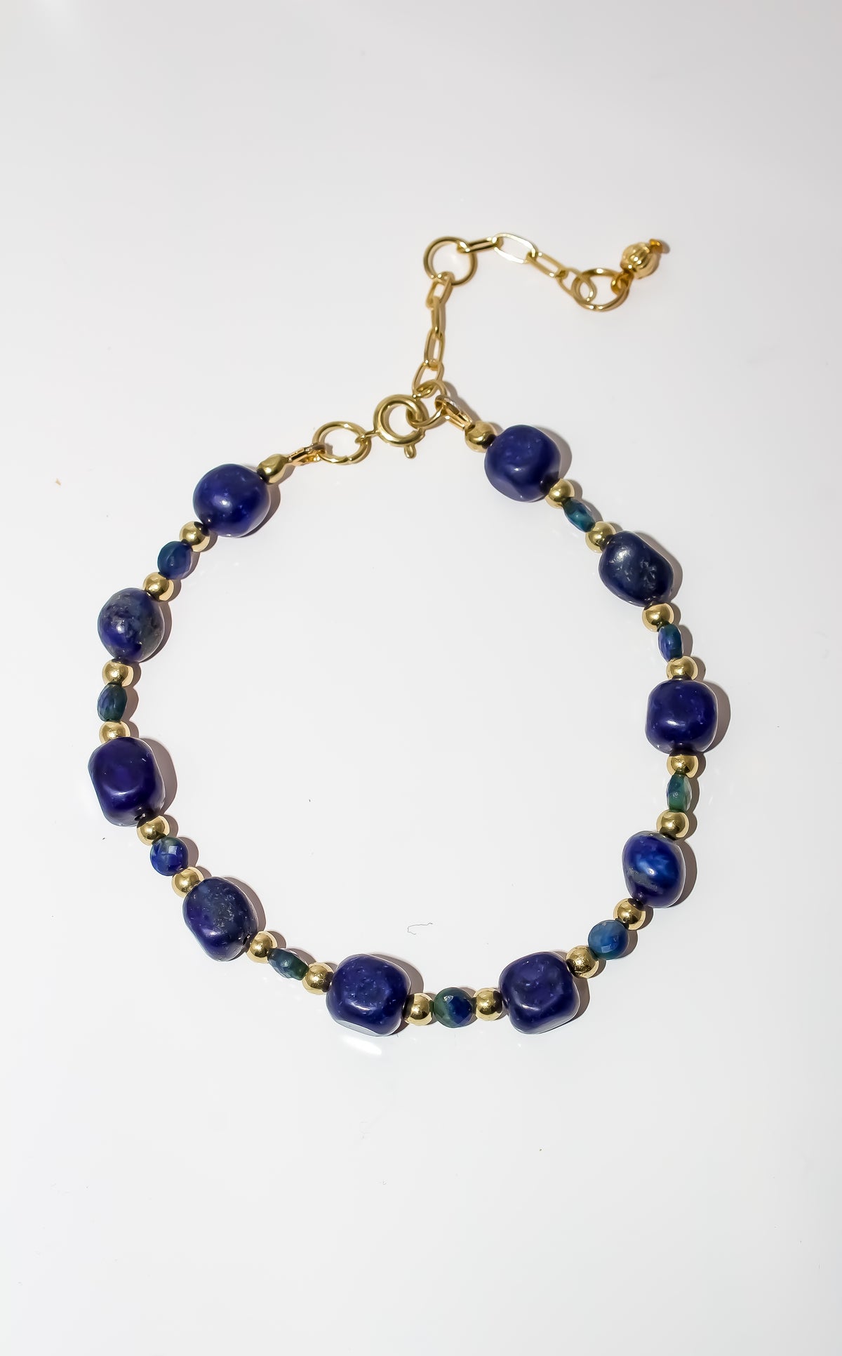 Lapis Lazuli Beaded Bracelet with Emerald Accents and Gold Spacers