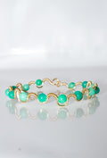 Gold Wire-Wrapped Wave Bracelet with Green Gemstone Beads
