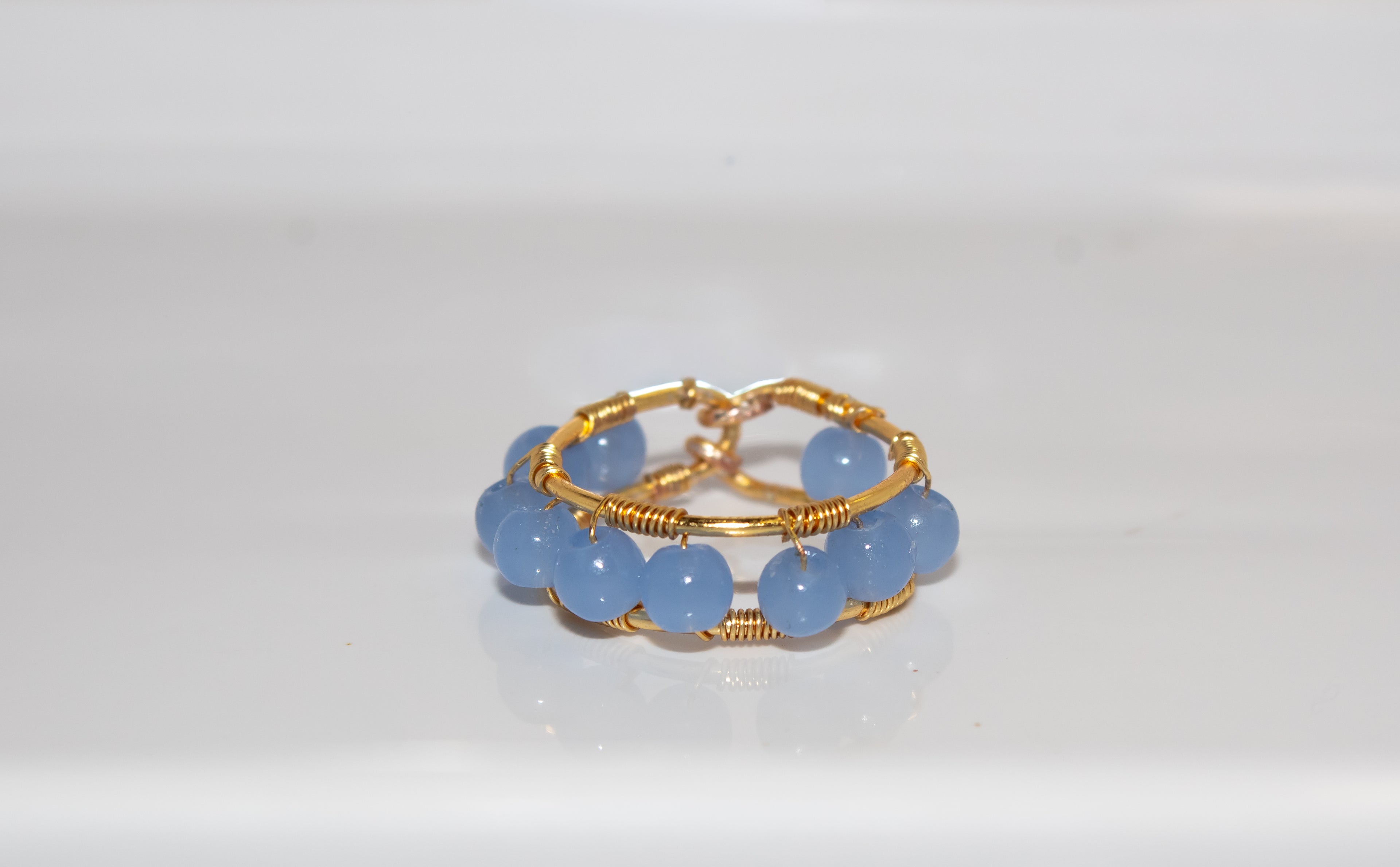 Gold Light Blue Gemstone Halo Ring
